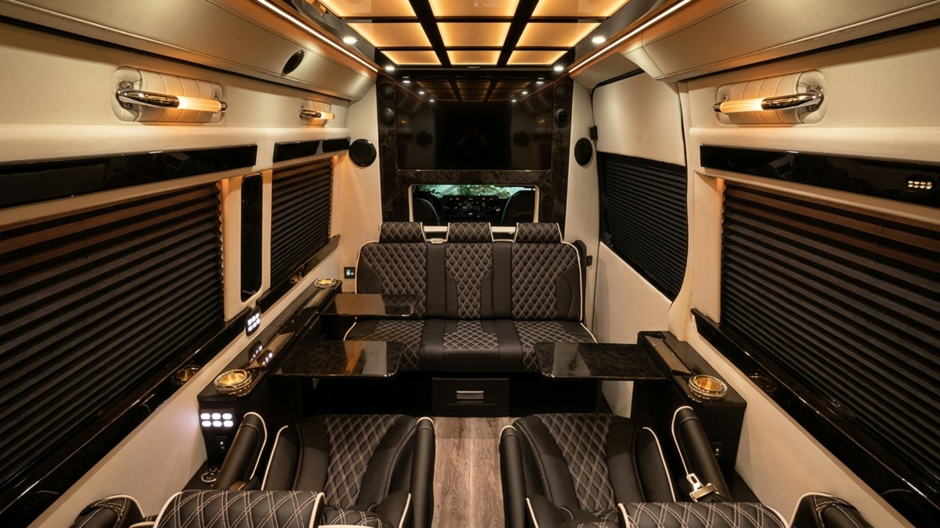 Jet-style Sprinter interior — ambient lighting and TVs